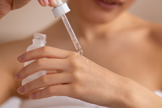 close-up-woman-with-serum